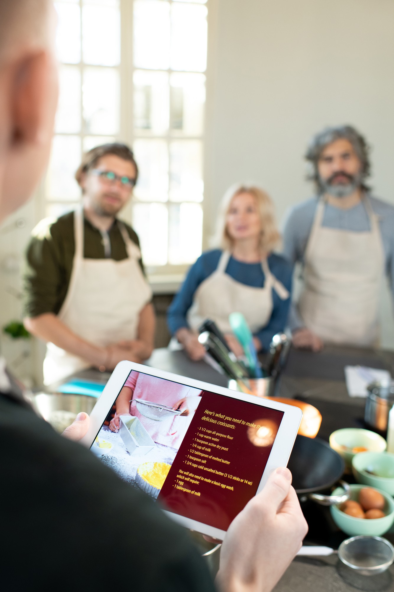 Chef consulting with client over menu